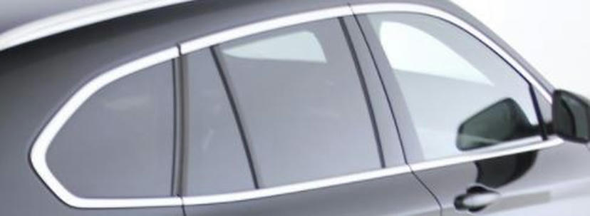 Omlijsting zijruiten in mat aluminium